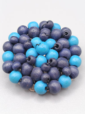 Moderne Vintage Brosche mit blauen Holzperlen
