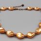 Elegante apricotfarbene Perlen Kette Barock-Stil