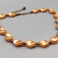 Elegante apricotfarbene Perlen Kette Barock-Stil
