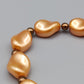 Elegante apricotfarbene Perlen Kette Barock-Stil