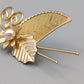 Edle Vintage Brosche in Gold Optik Florales Design