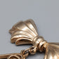 Elegante Schleifen Brosche in Goldoptik Vintage