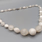 Elegante Perlenkette in Weiß und Vintage Design