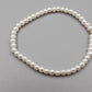 Eleganter Elastisches Perlen Armband in Weiß