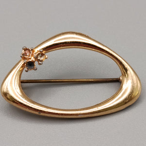 Elegante goldfarbene Brosche mit Strasssteinen Vintage