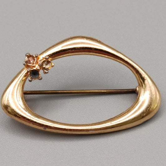 Elegante goldfarbene Brosche mit Strasssteinen Vintage