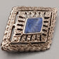 Klassische Art Déco Brosche mit blauem Emaille-Inlay