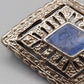 Klassische Art Déco Brosche mit blauem Emaille-Inlay