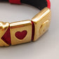 Elegantes Damen Armbandmit vergoldeten Herz-Motiven
