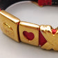 Elegantes Damen Armbandmit vergoldeten Herz-Motiven