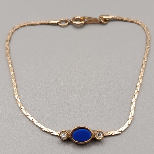 Elegantes Avon Damen Armband – Goldoptik mit blauem Cabochon