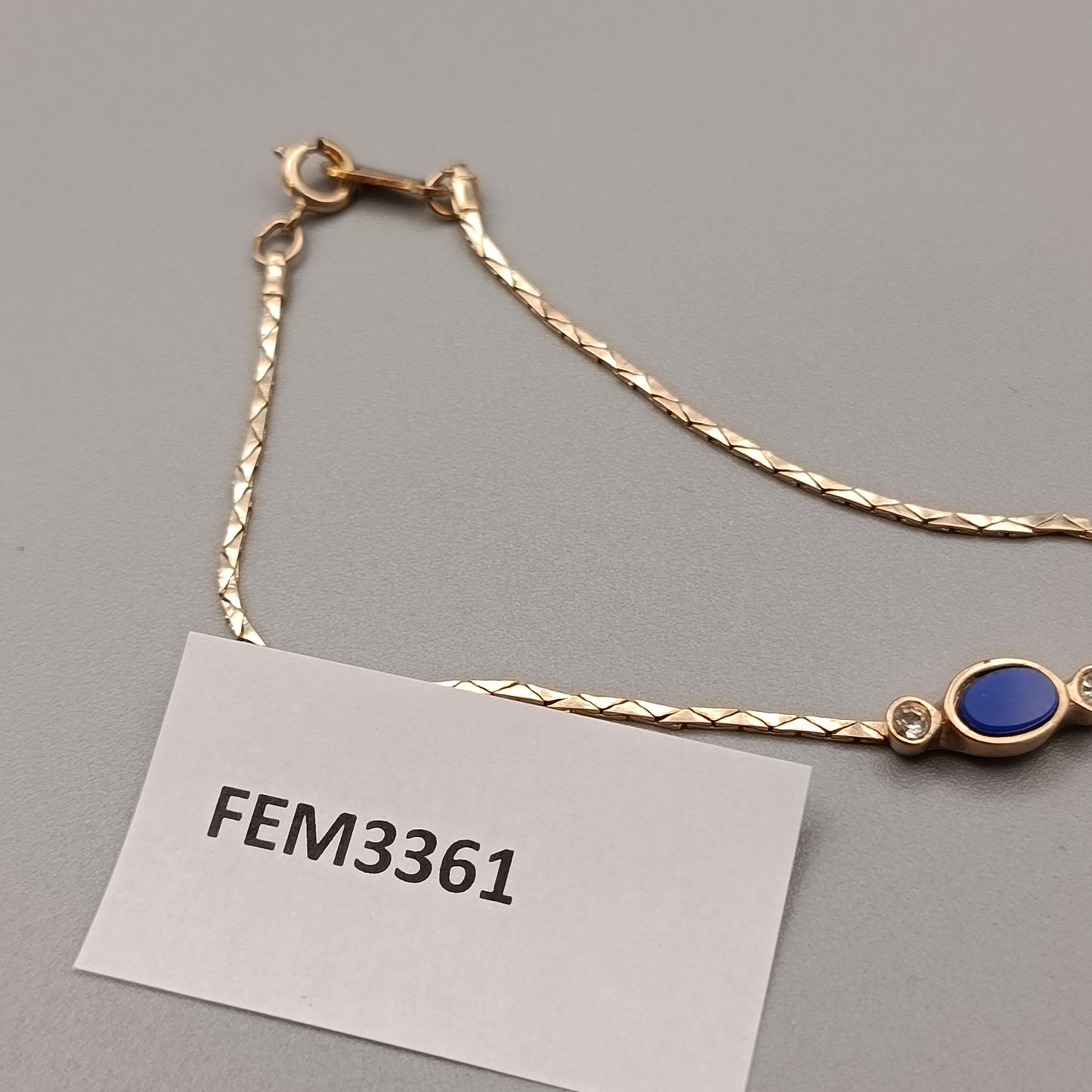 Elegantes Avon Damen Armband – Goldoptik mit blauem Cabochon