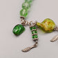 Spielerisches Bettelarmband in Grün-Optik – Charmanter Vintage Stil