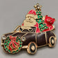 Festliche Vintage Brosche Weihnachtsmann im Auto – Verspielt