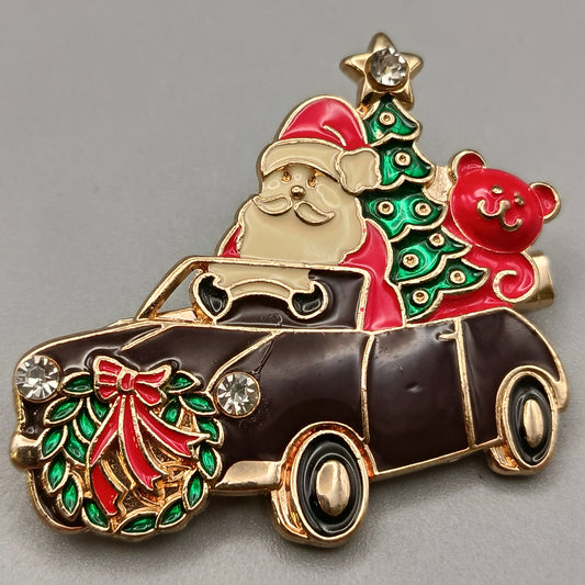 Festliche Vintage Brosche Weihnachtsmann im Auto – Verspielt