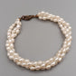 Elegantes Perlenarmband – Dreireihiges Design mit Weißperlen