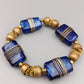Elastisches Statement-Armband Blaues Glas und Messing