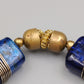 Elastisches Statement-Armband Blaues Glas und Messing