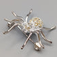 Elegante Spinnenbrosche – Glitzerndes Design mit Strasssteinen