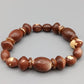 Elegantes Perlenarmband – Elastisches Design in Braun