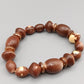 Elegantes Perlenarmband – Elastisches Design in Braun