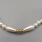 Elegante Perlenkette – Klassisches Design mit goldenen Akzenten