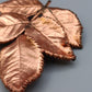 Elegante Kupferbrosche – Naturinspiriertes Design