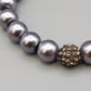 Elegantes Perlenarmband – Stilvolles Design in Grau
