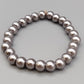 Elegantes Perlenarmband – Stilvolles Design in Grau