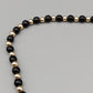 Elegante Perlenkette – Klassisches Design in Schwarz und Gold
