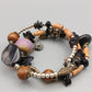 Elegantes Mehrreihiges Armband Design mit Perlen und Anhängern