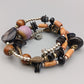 Elegantes Mehrreihiges Armband Design mit Perlen und Anhängern