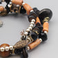 Elegantes Mehrreihiges Armband Design mit Perlen und Anhängern