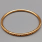 Eleganter Armreif – Stilvolles Design in Goldoptik