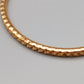 Eleganter Armreif – Stilvolles Design in Goldoptik