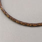 Eleganter Armreif – Stilvolles Design in Braun und Gold