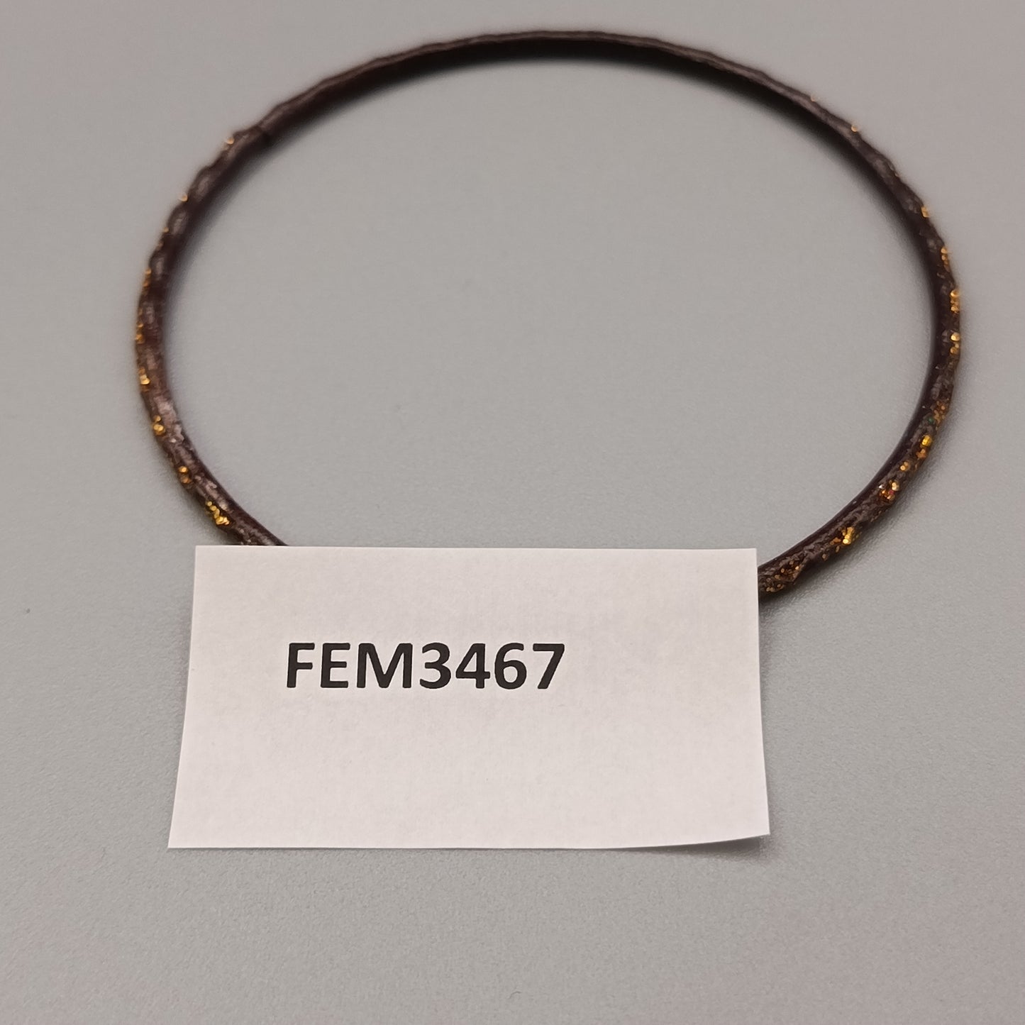 Eleganter Armreif – Stilvolles Design in Braun und Gold