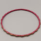 Eleganter Armreif – Stilvolles Design in Rot und Gold