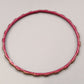 Eleganter Armreif – Stilvolles Design in Rot und Gold