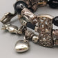 Elegantes mehrreihiges Armband – Silberfarbenes Design