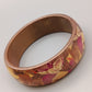 Eleganter Armreif – Florales Design in Warmen Farben