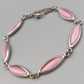 Elegantes Gliederarmband mit Rosa Steinen – Silberfarben