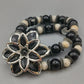 Auffälliges Perlen Armband mit Blumen-Element