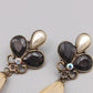 Elegante Ohrhänger mit Perlen und schwarzen Steinen
