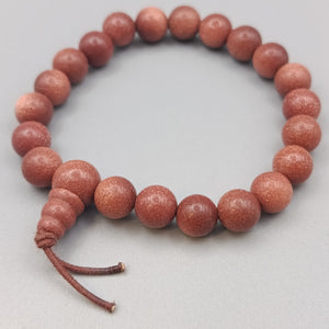 Elegantes Sonnenstein Perlenarmband – Glänzend