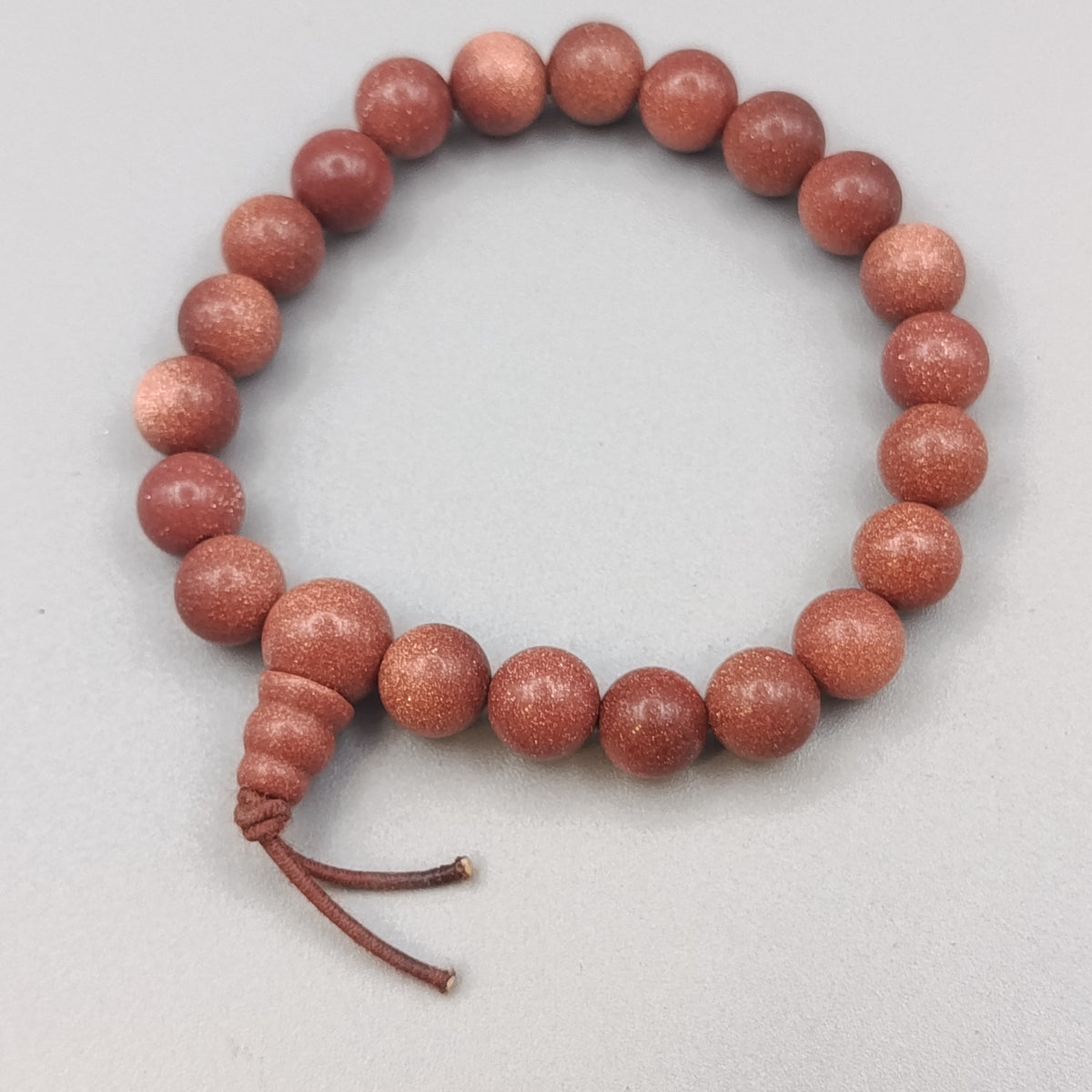 Elegantes Sonnenstein Perlenarmband – Glänzend
