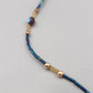 Elegante Glasperlen Kette – Design in Blau und Gold