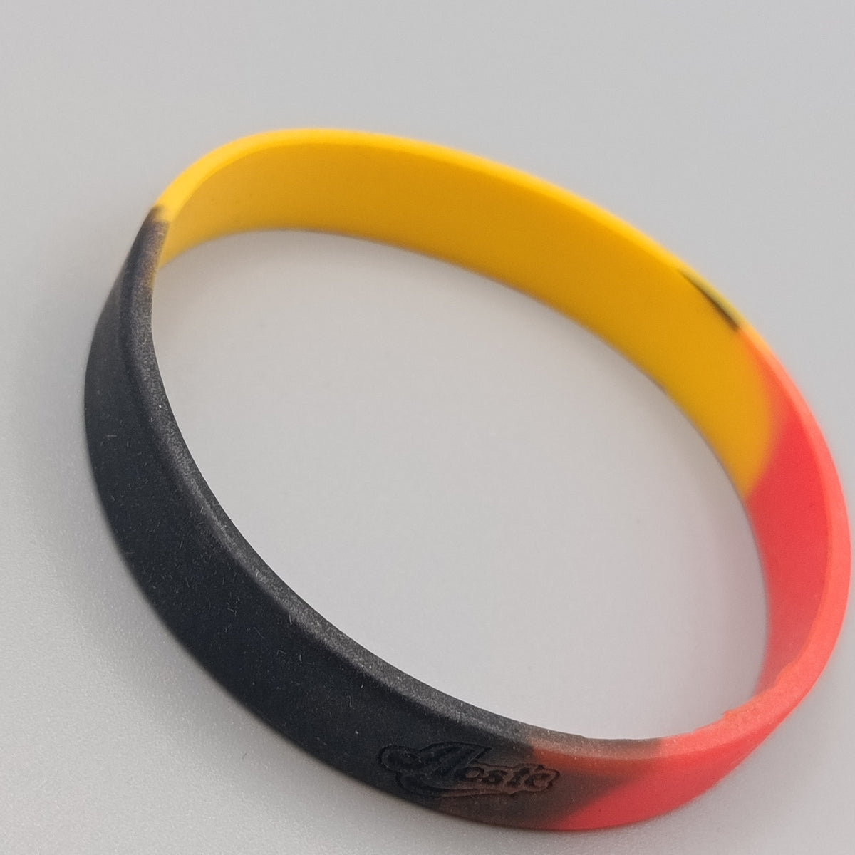 Elastisches Silikon Armband – Schwarz Rot Gelb