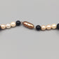 Elegante Perlenkette – Lava- und Korallenperlen