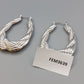 Elegante silberfarbene Creolen – Statement Ohrringe